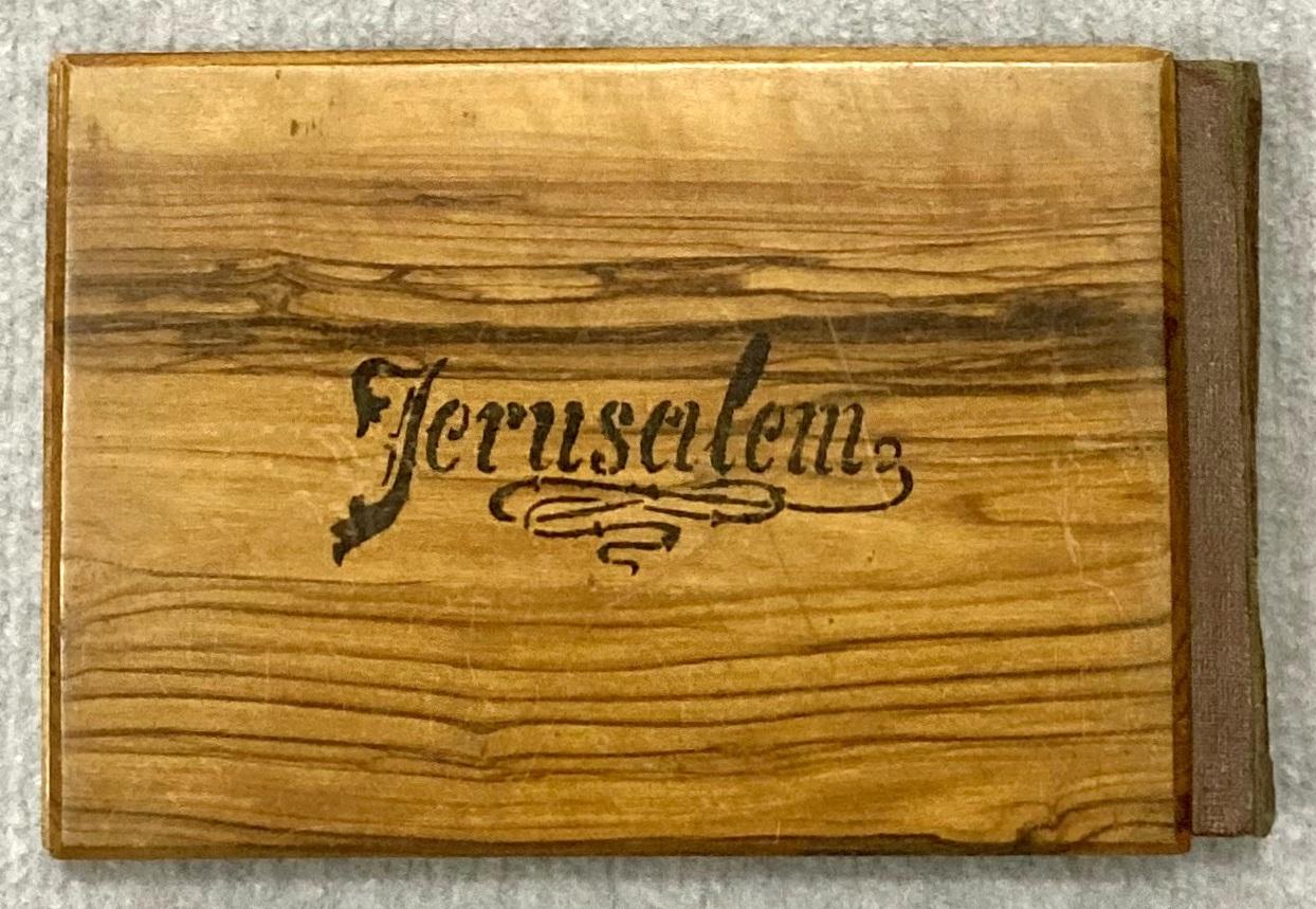 Back cover of souvenir olive wood album 