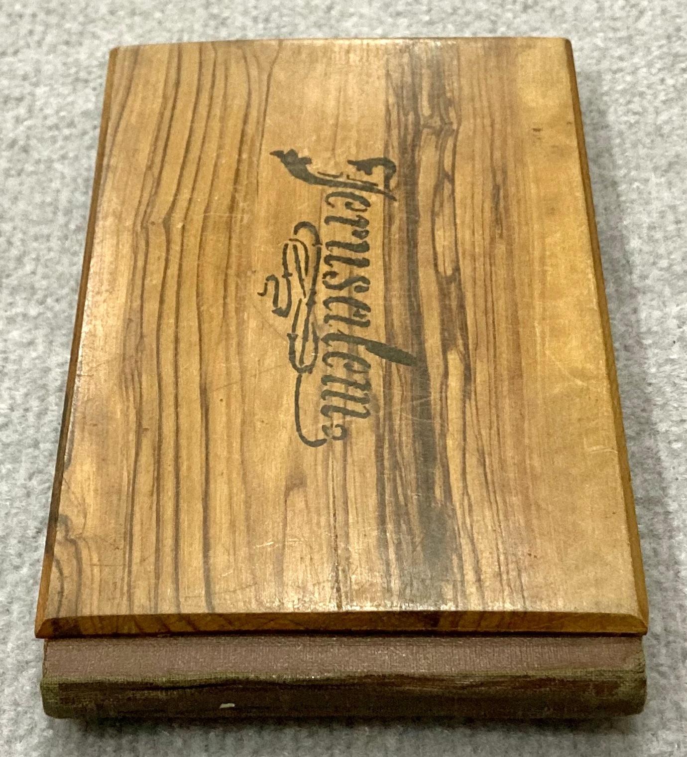 End view of reverse of souvenir olive wood album 