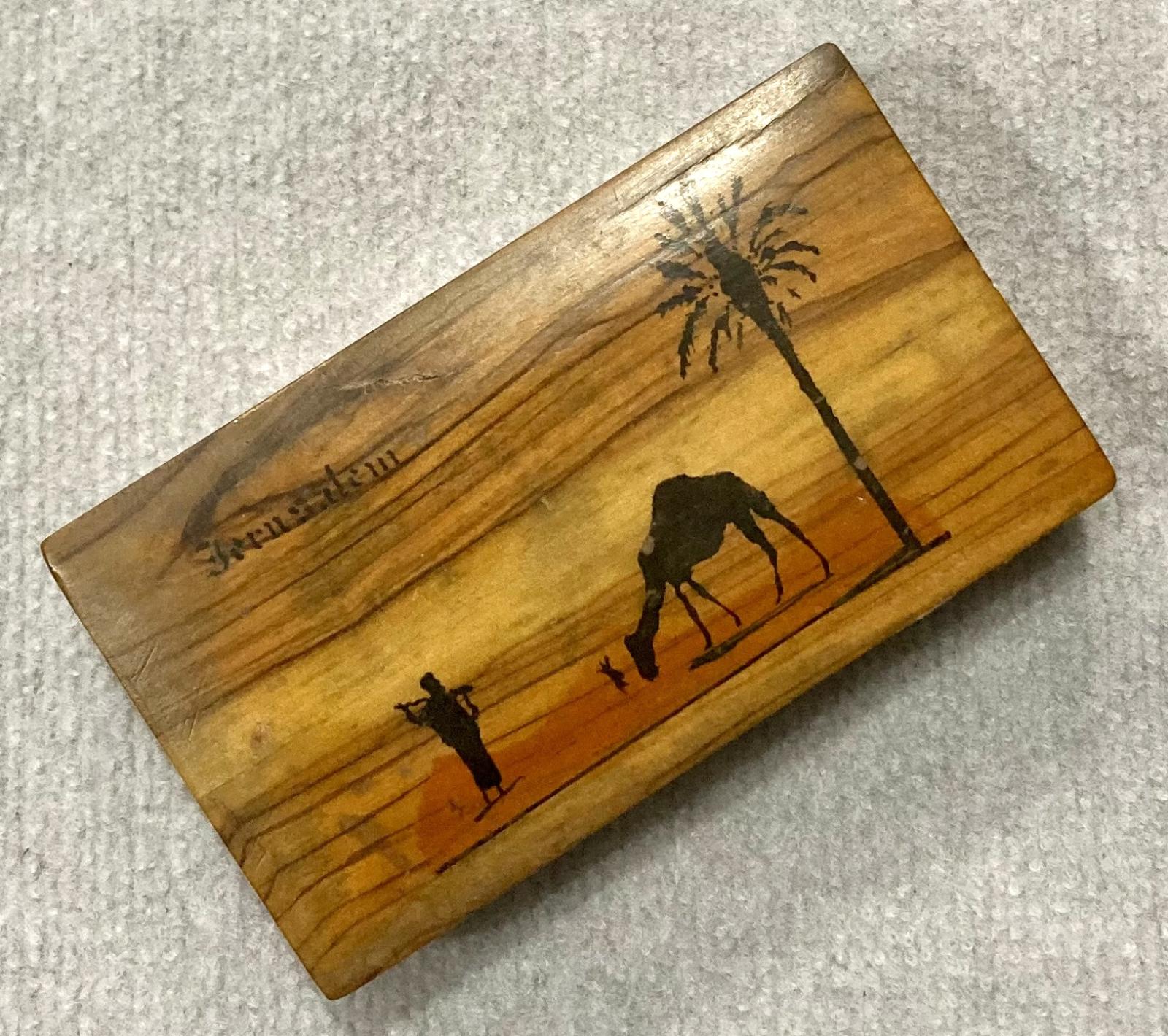 Oblique view of top of souvenir olive wood box from Jerusalem