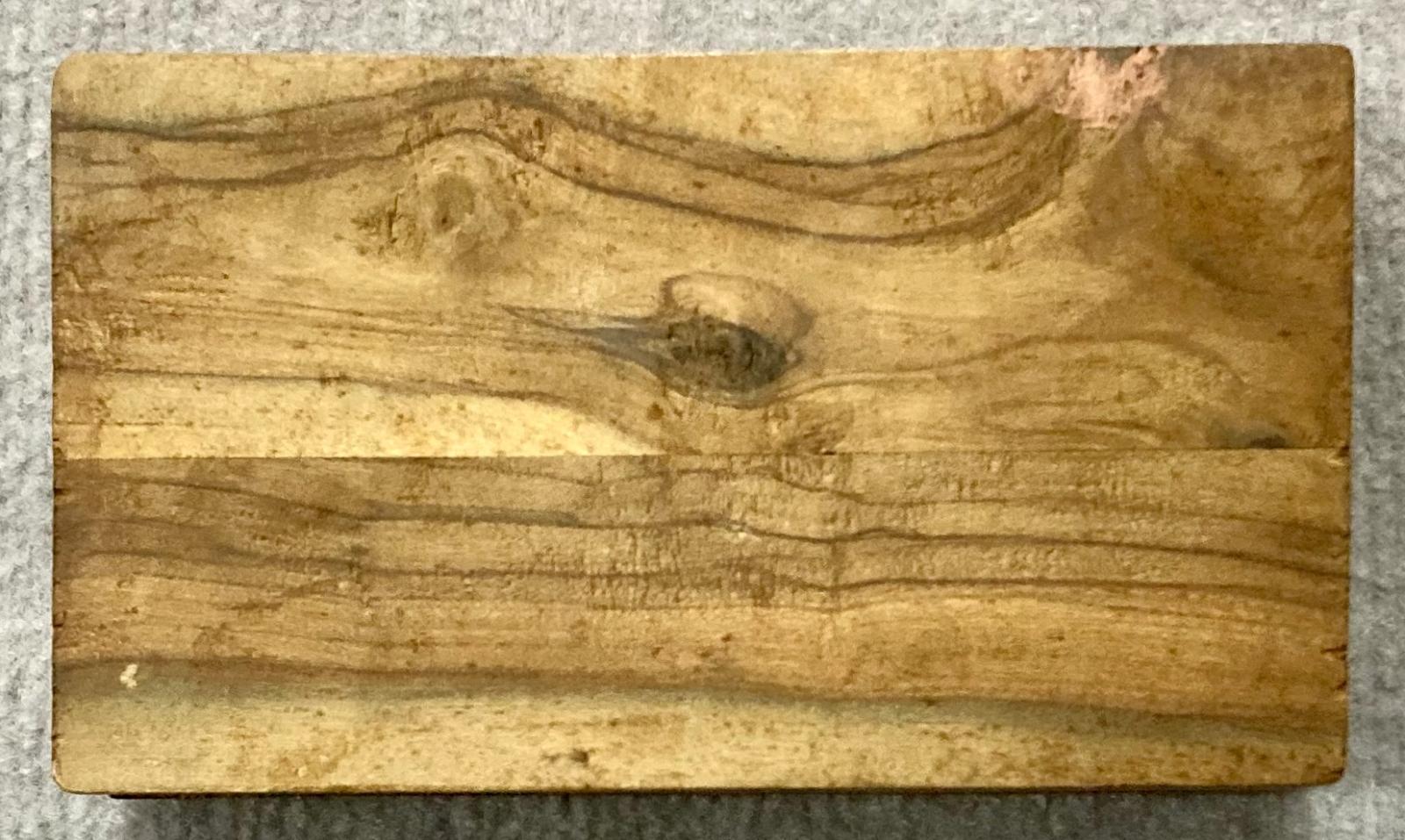Underside of souvenir olive wood box from Jerusalem