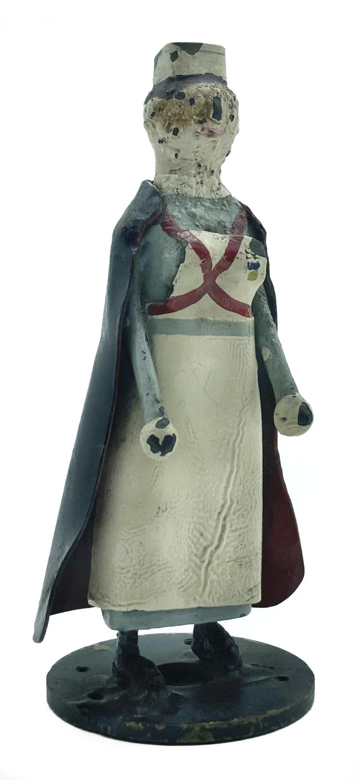 Metal nurse figurine made at RAF Biggin Hill - oblique view