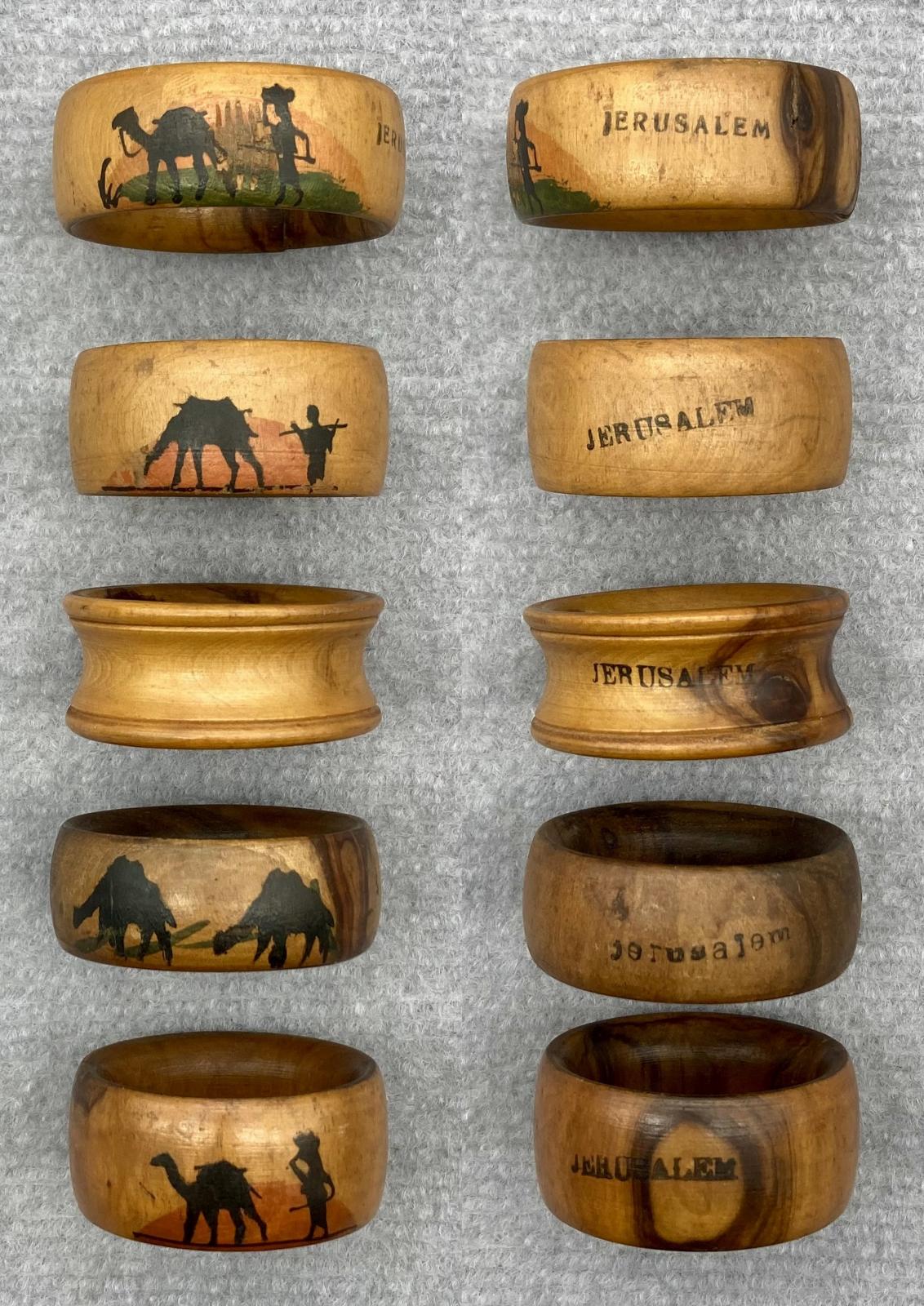 Souvenir olive wood napkin rings from Jerusalem showing edge decoration
