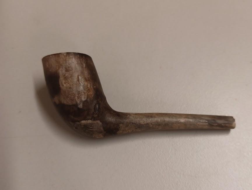 Left hand side of Pipe - wolf image engraved on bowl