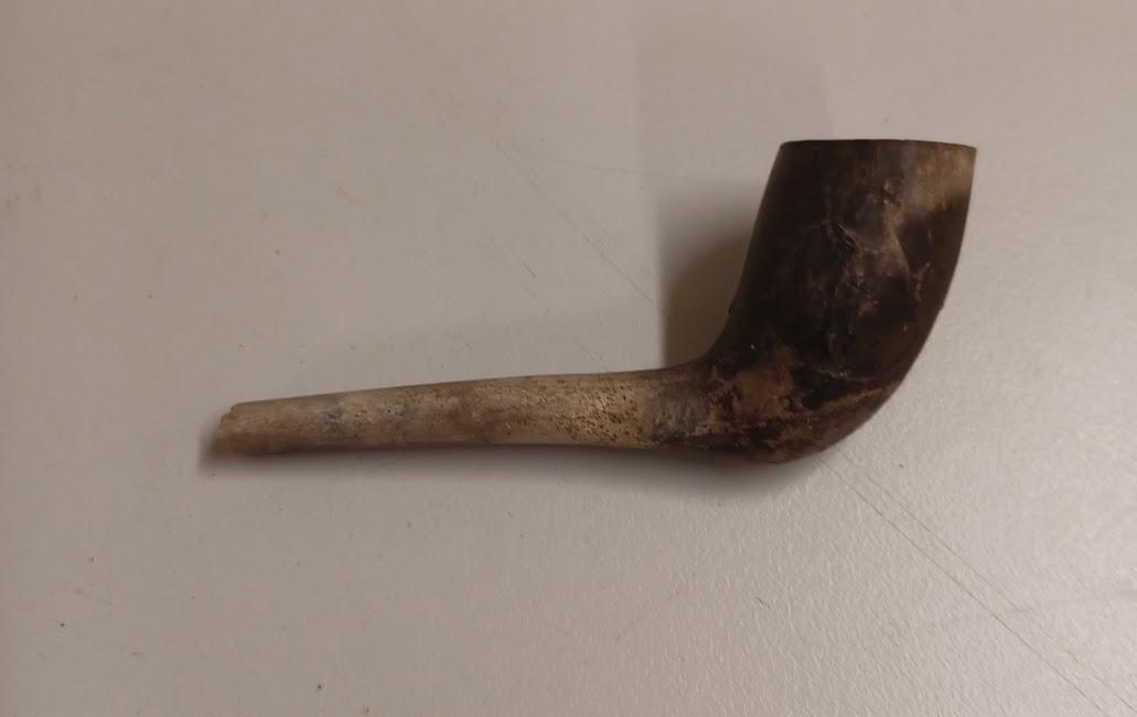 Right hand side of Pipe - wolf image engraved on bowl