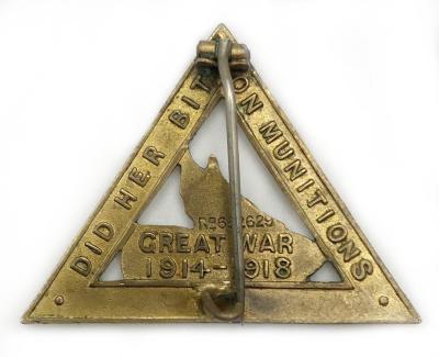 Reverse of 'Speed Up Munitions and Guns' Women's Munition Workers badge