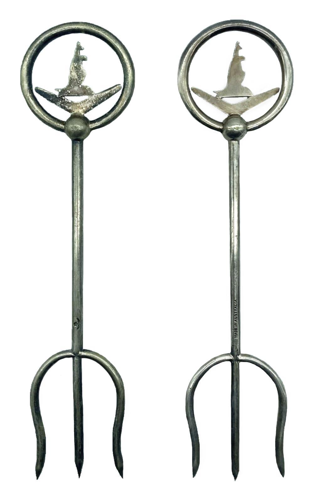 Reverse of silver plated trident bread forks with decorative tops - Kangaroo