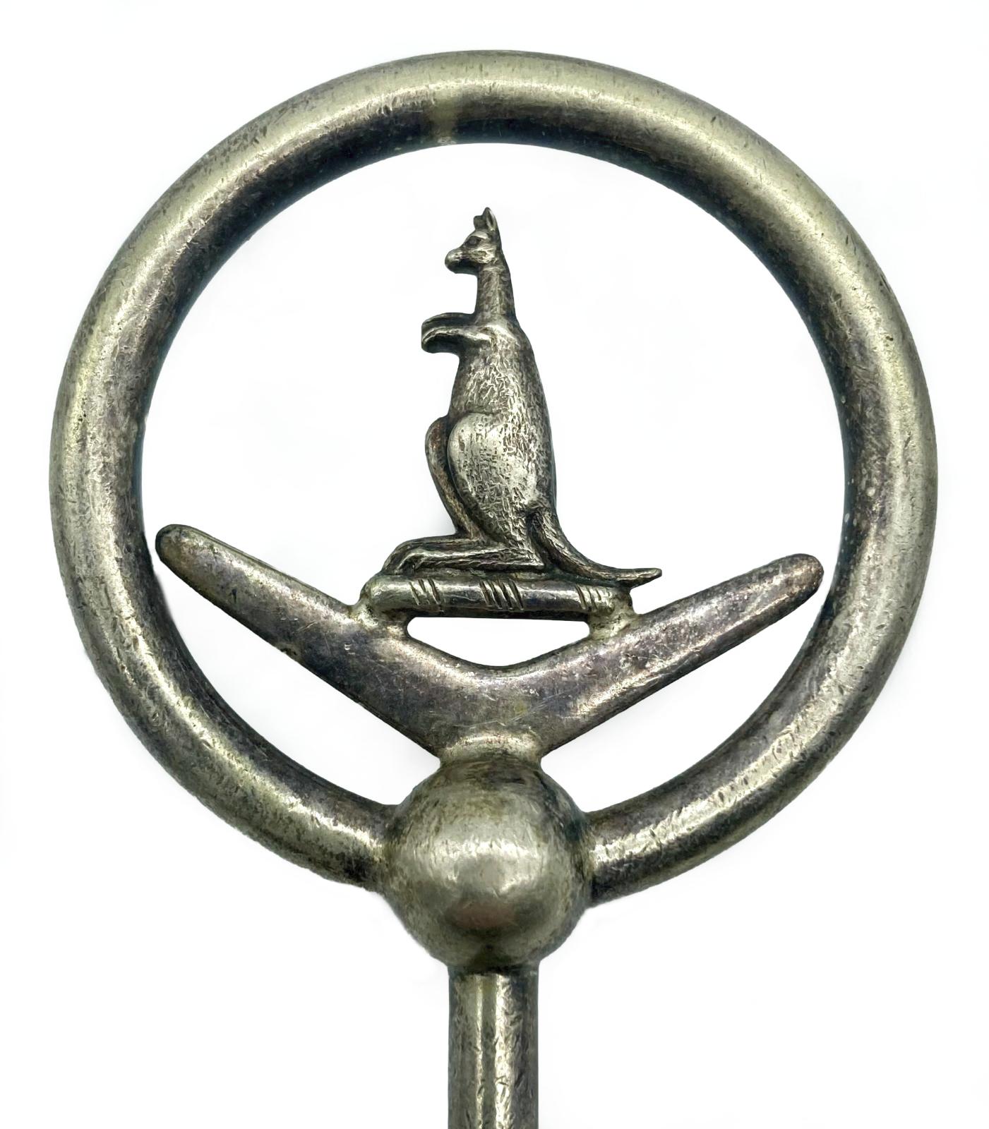 Close-up of silver plated fork with kangaroo - 1