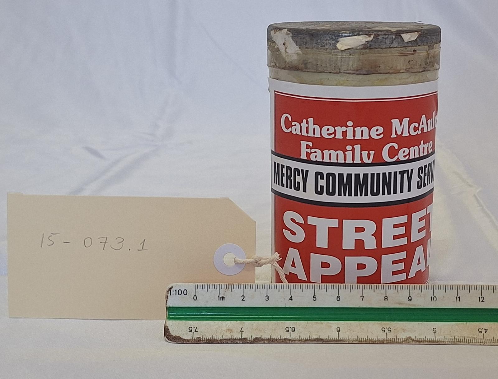 15-073.1 - Collection tin with scale and tag image