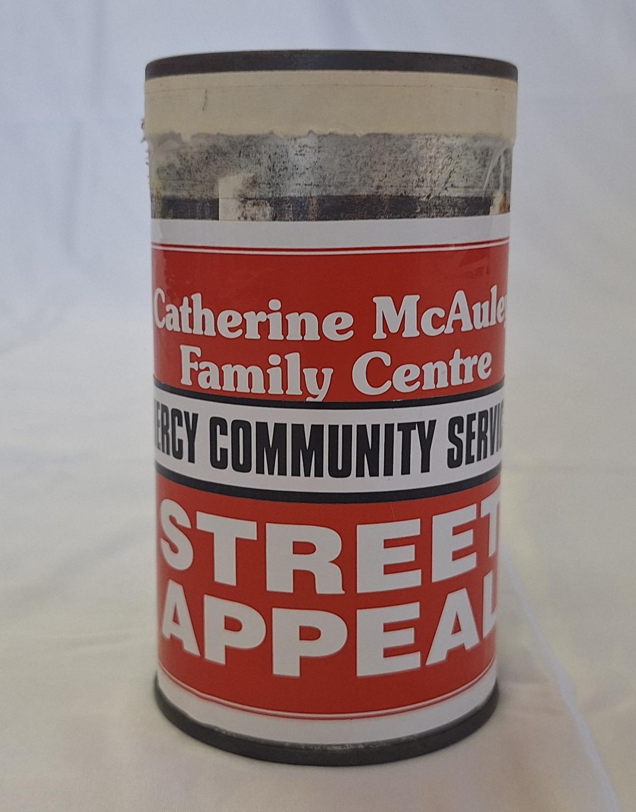 15-073.2 - Collection tin with background image.