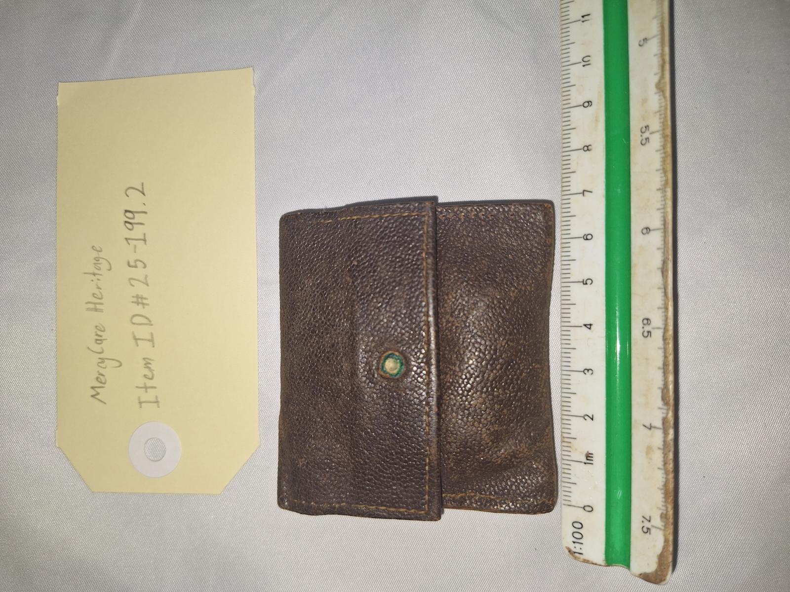 25-199.2 leather pouch with scale and tag