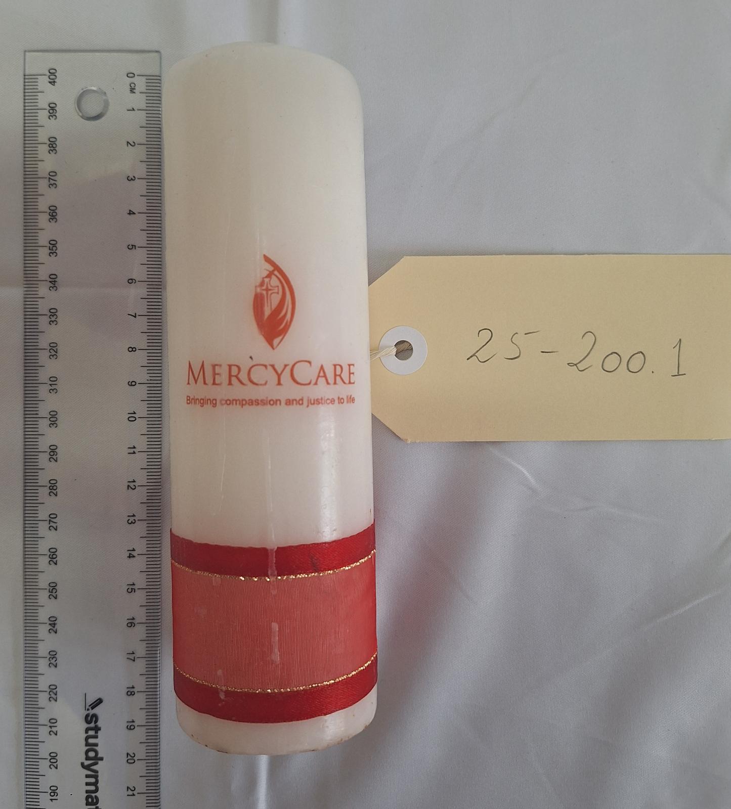 25-200.1 mercycare candle with scale and tag image