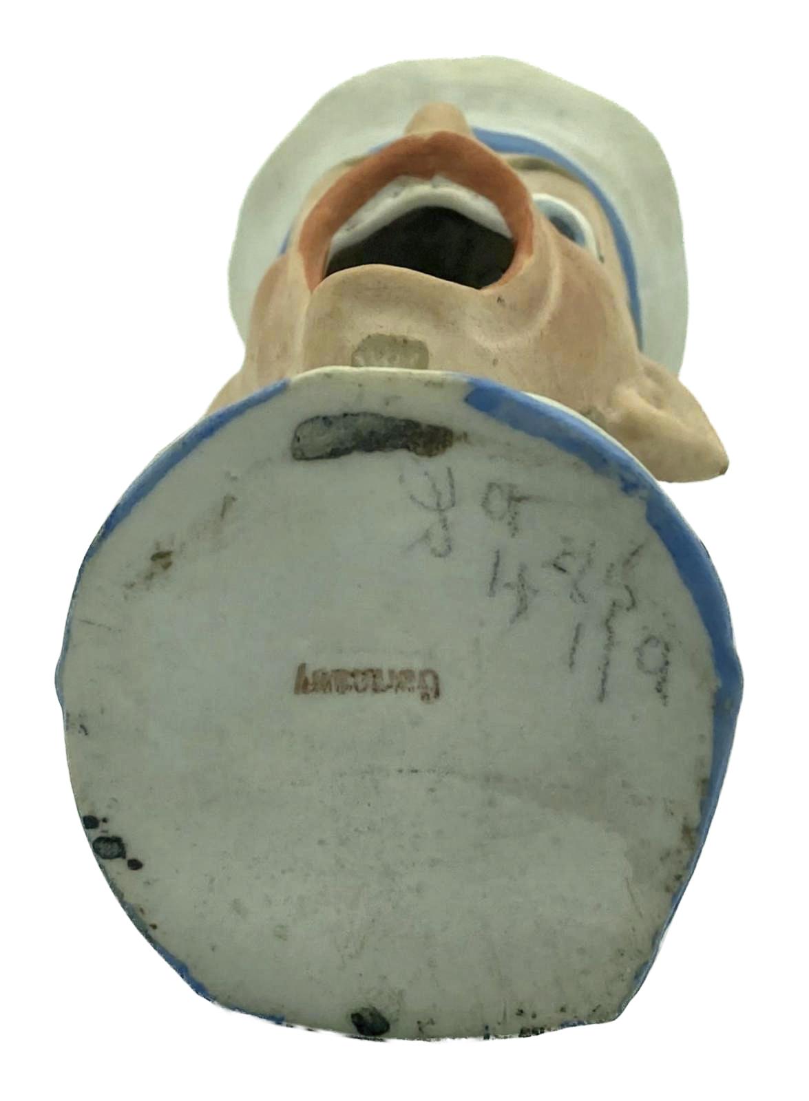 Antique Schafer & Vater match holder depicting a German sailor - base view