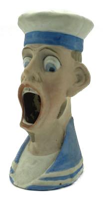 Antique Schafer & Vater match holder depicting a German sailor - oblique view