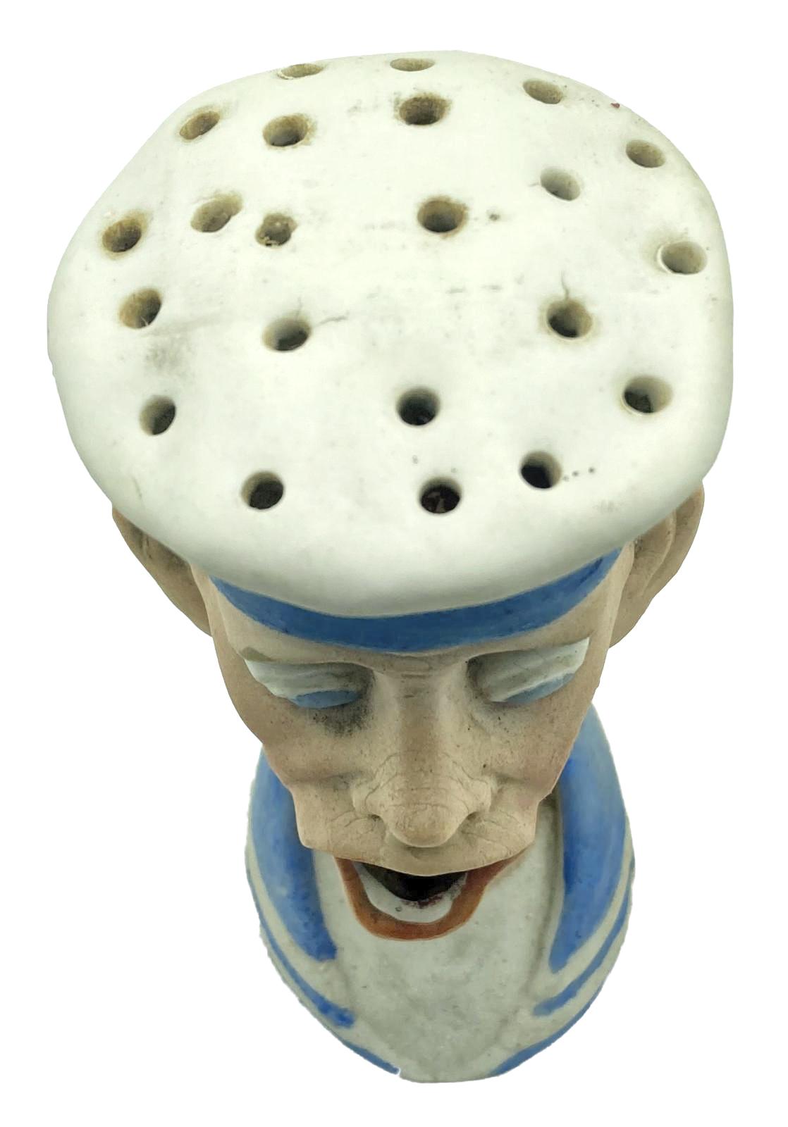 Antique Schafer & Vater match holder depicting a German sailor - top view