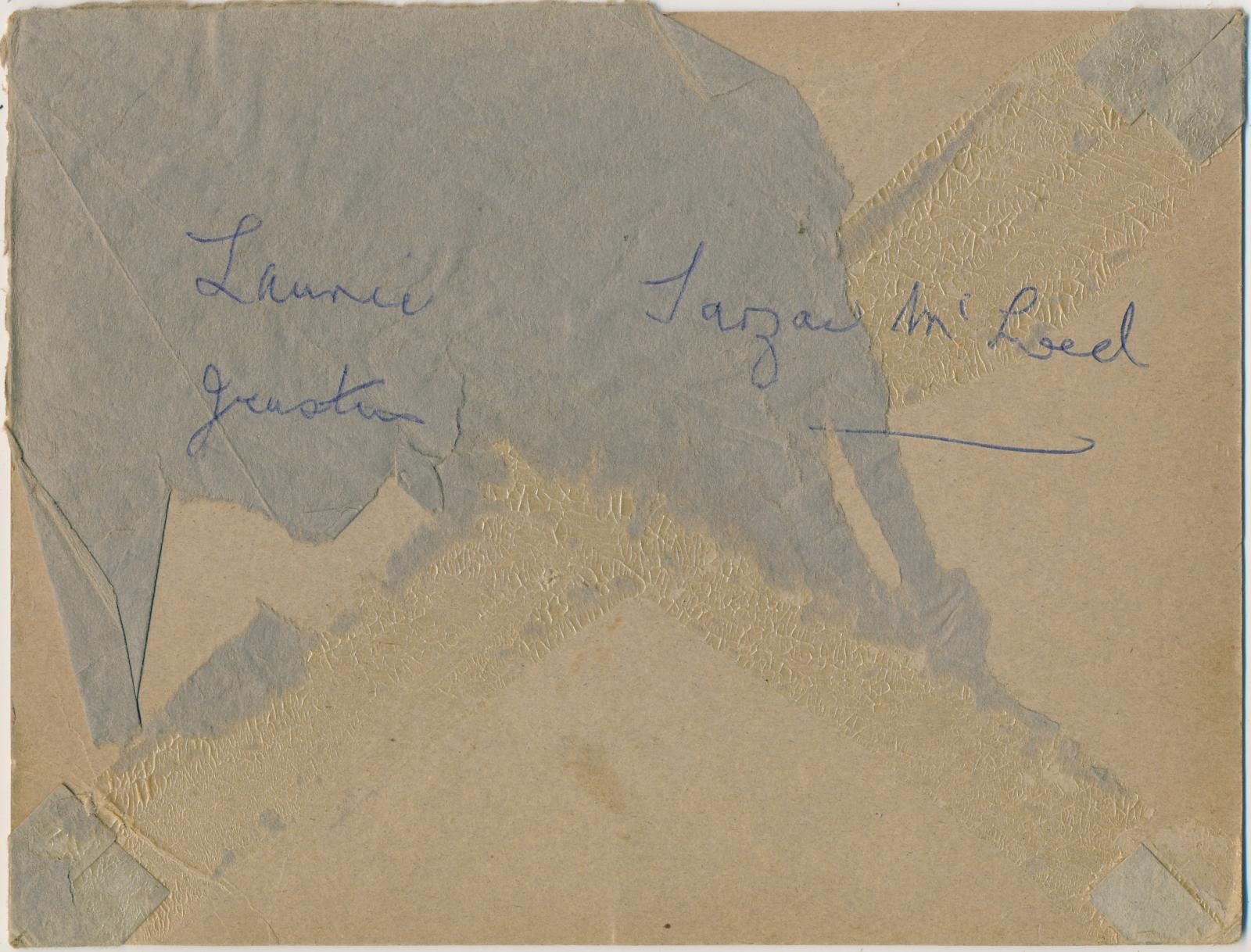 Back of photograph of Laurie Justins and Tarzac McLeod