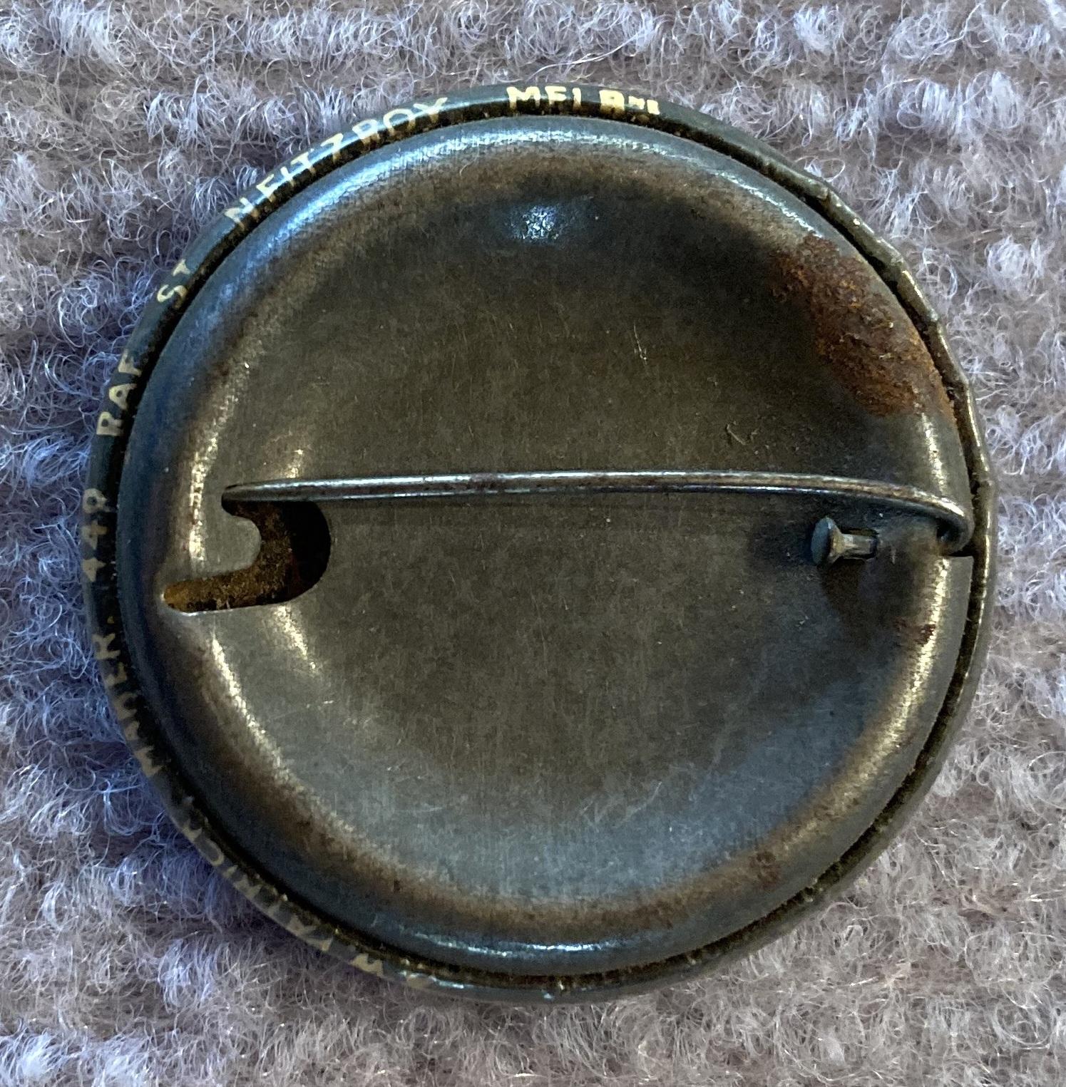 Reverse of Reverse of Essendon Aerodrome membership badge showing maker's details