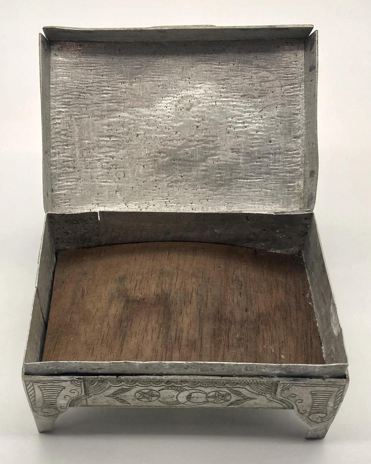 Front view of open Ottoman POW trench art cigarette box