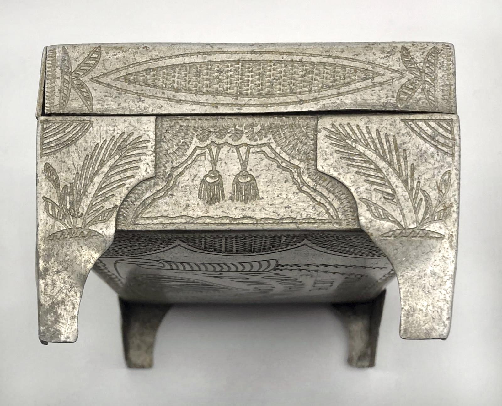 Top view of one side of Ottoman POW trench art cigarette box