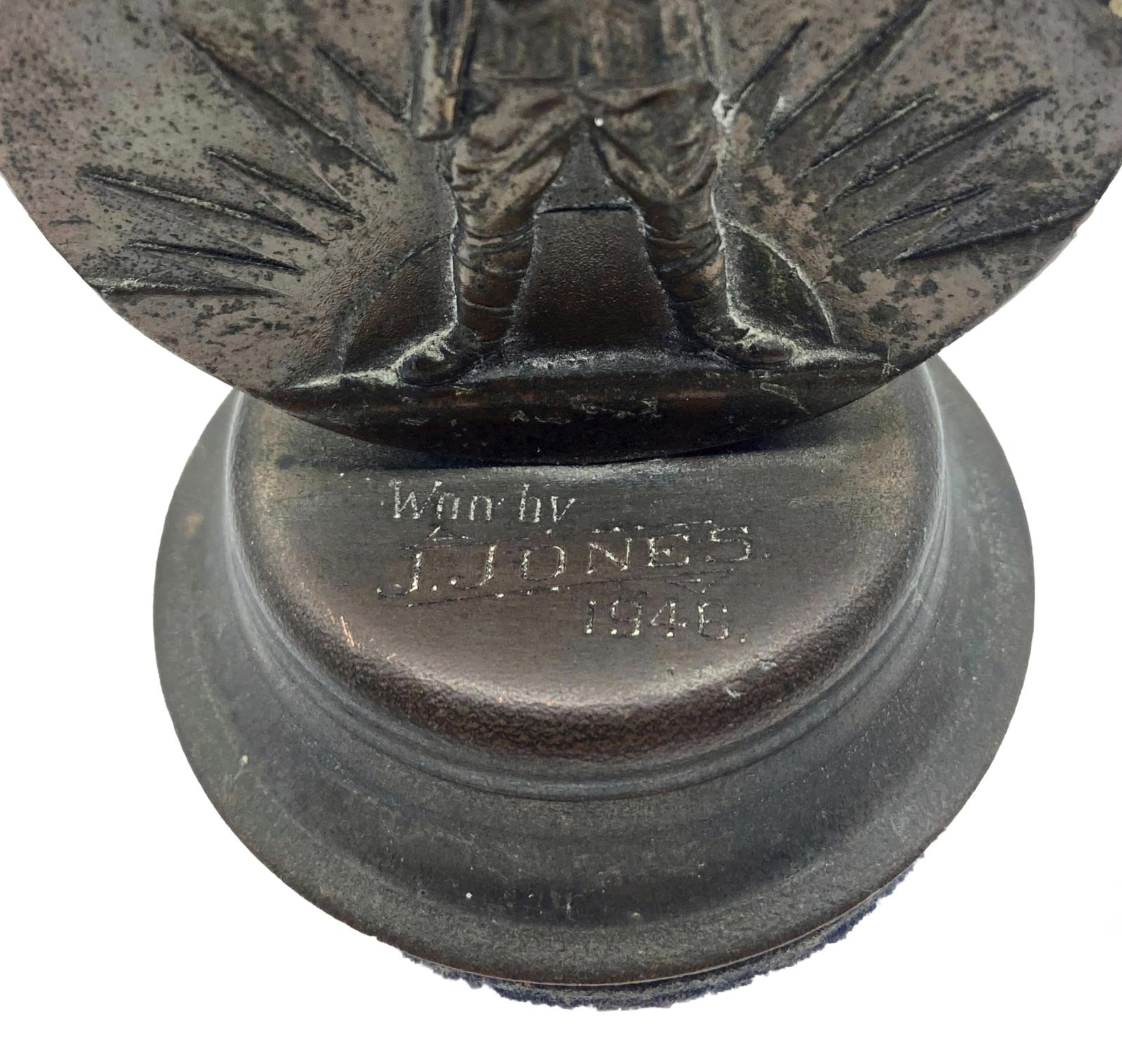 Close-up of Victorian Golf Association War Medallion showing inscription