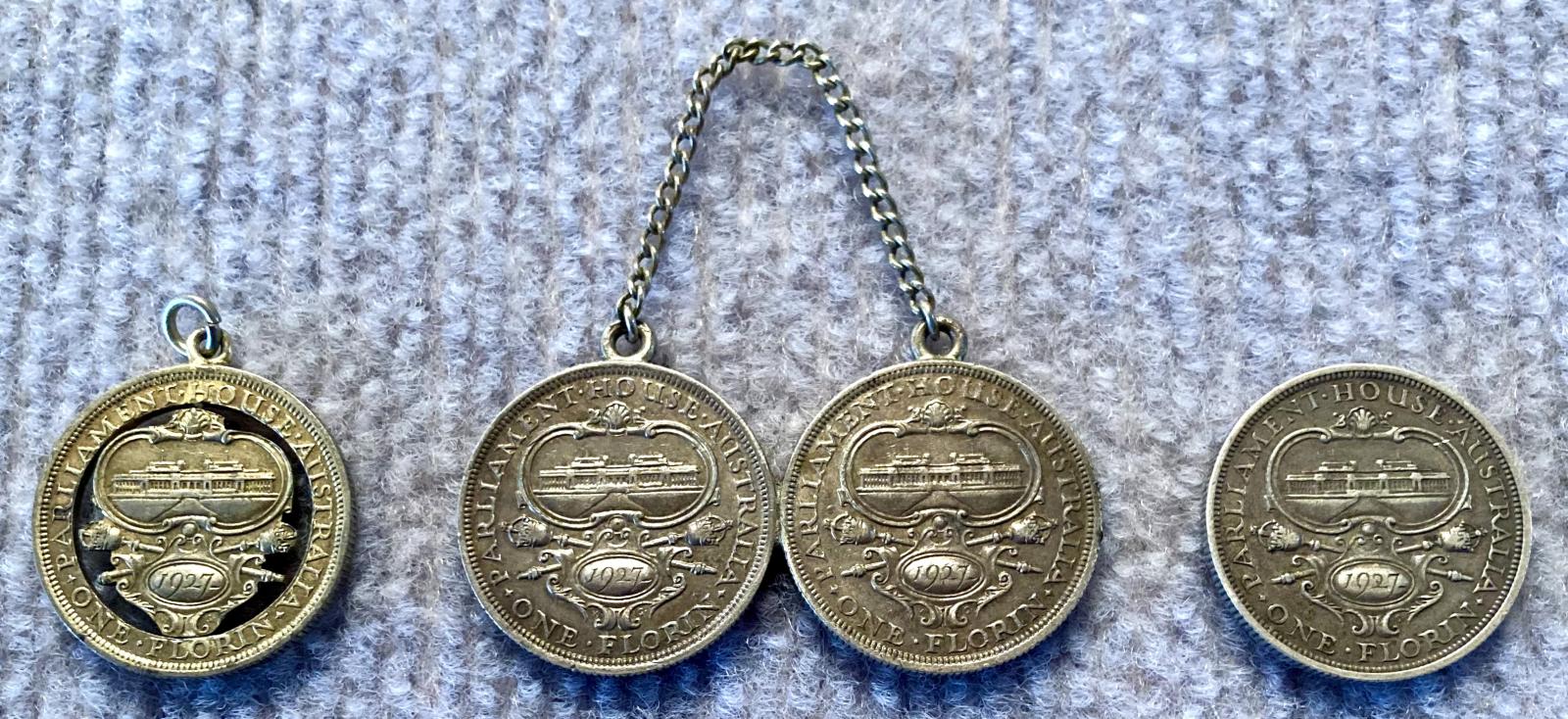 Two modified pieces of jewellery and the original coin