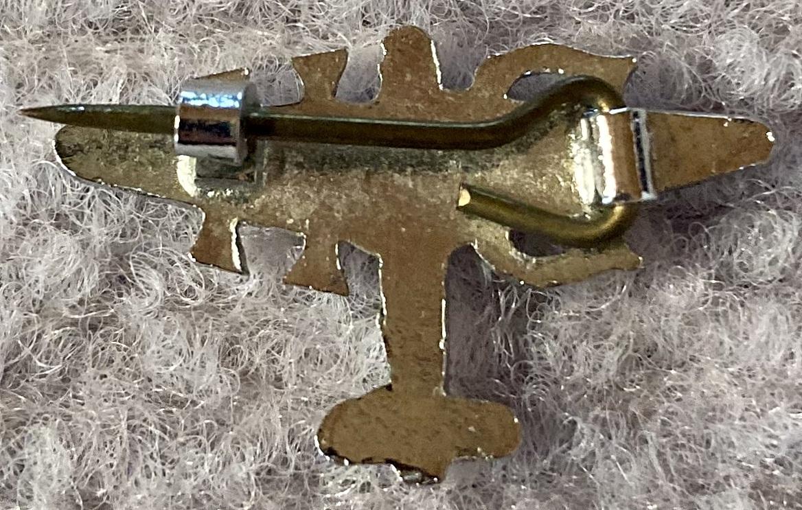 Reverse of De Havilland Aircraft Co. Ltd. lapel badge