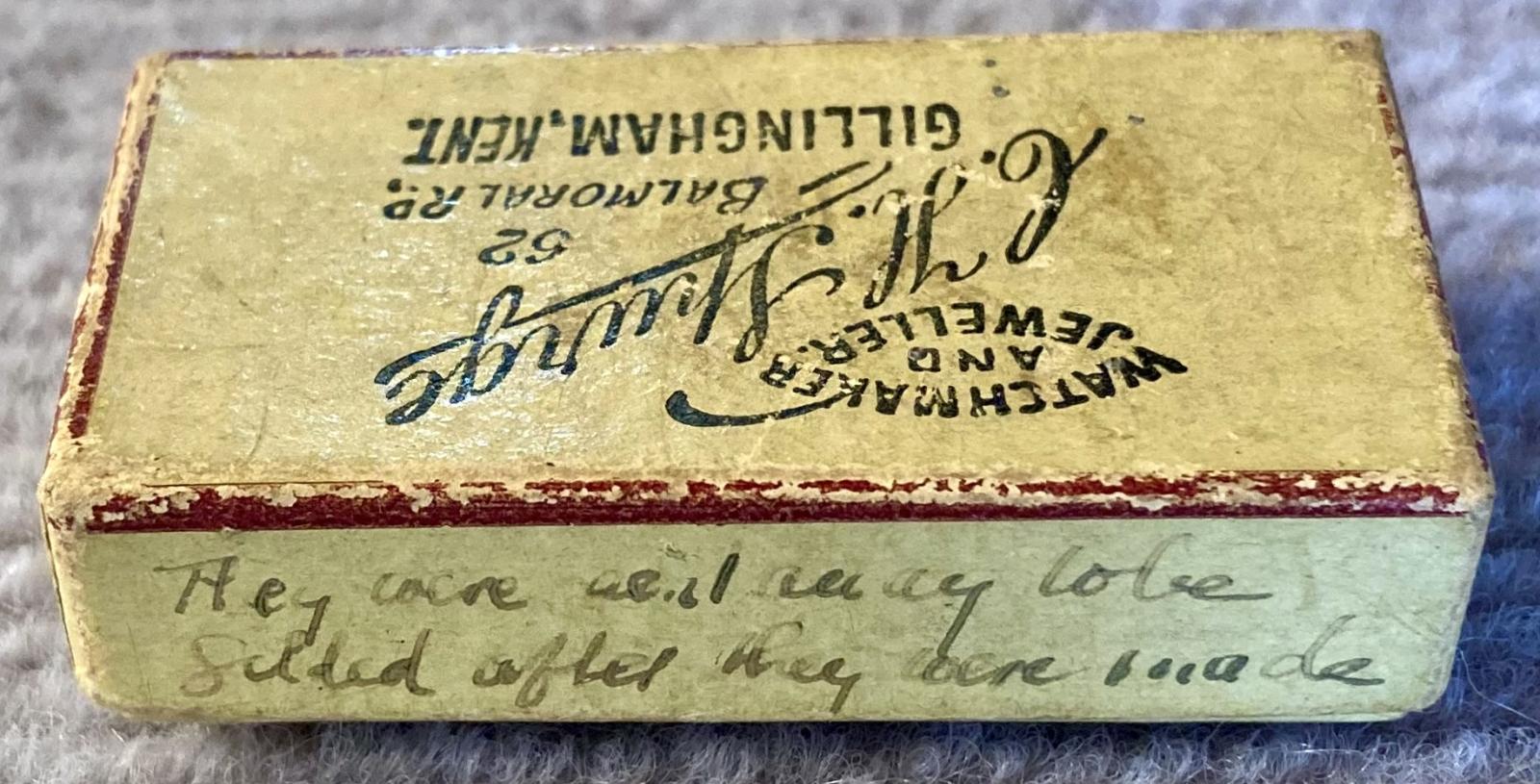 Box showing writing on third side