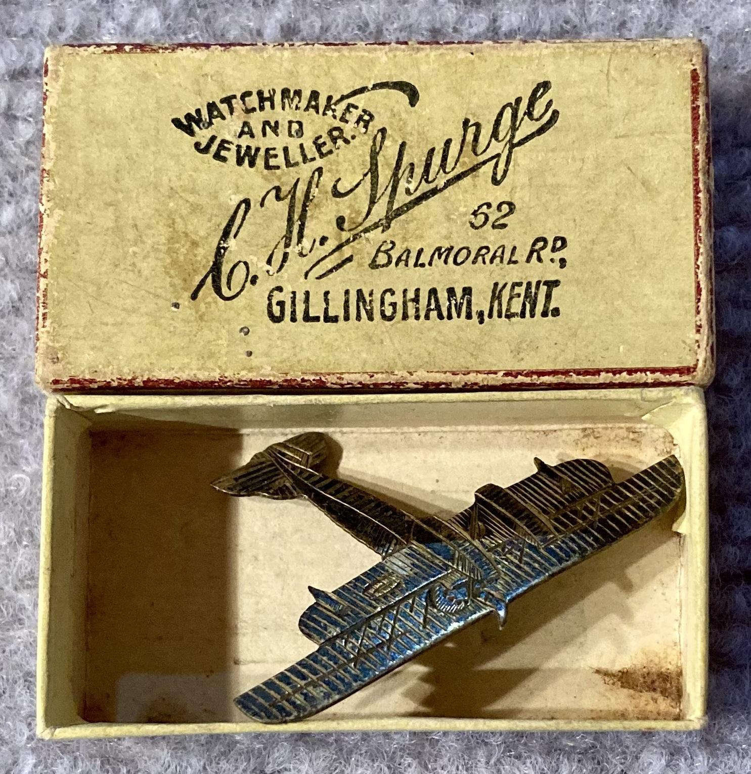 Short Brothers plane fundraising brooch inside open box