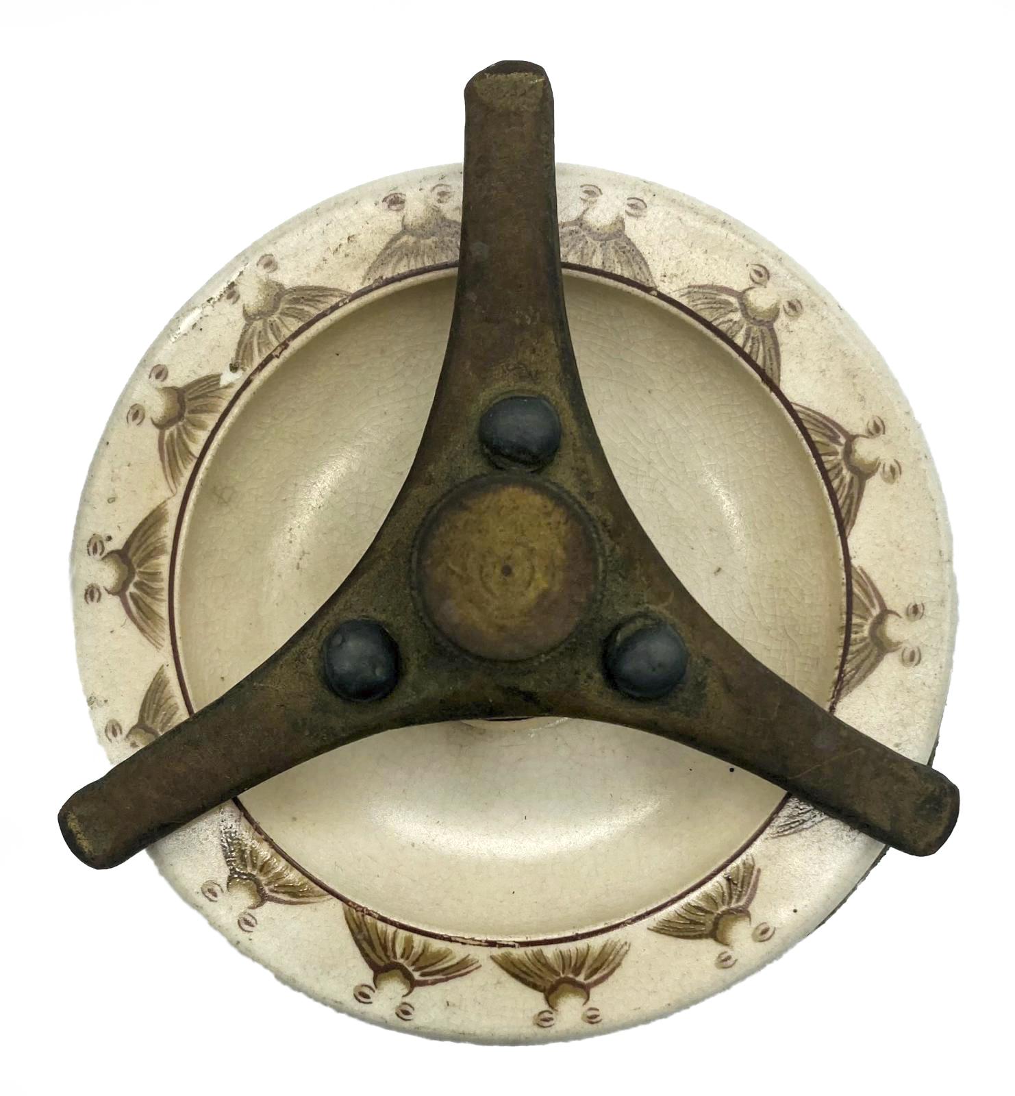 WWI era tobacco jar featuring Bruce Bairnsfather cartoon - top view of lid