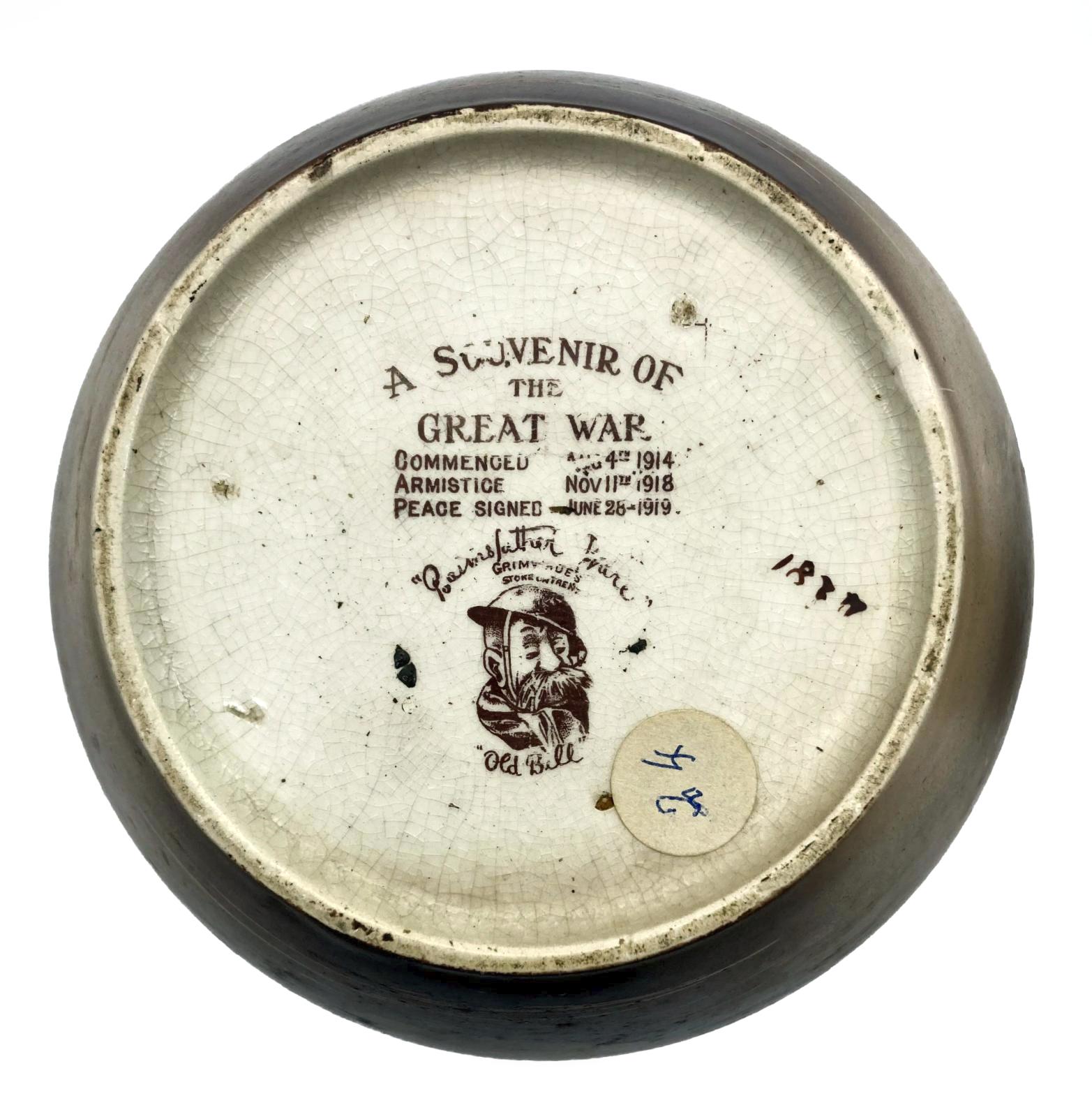 WWI era tobacco jar featuring Bruce Bairnsfather cartoon - base view