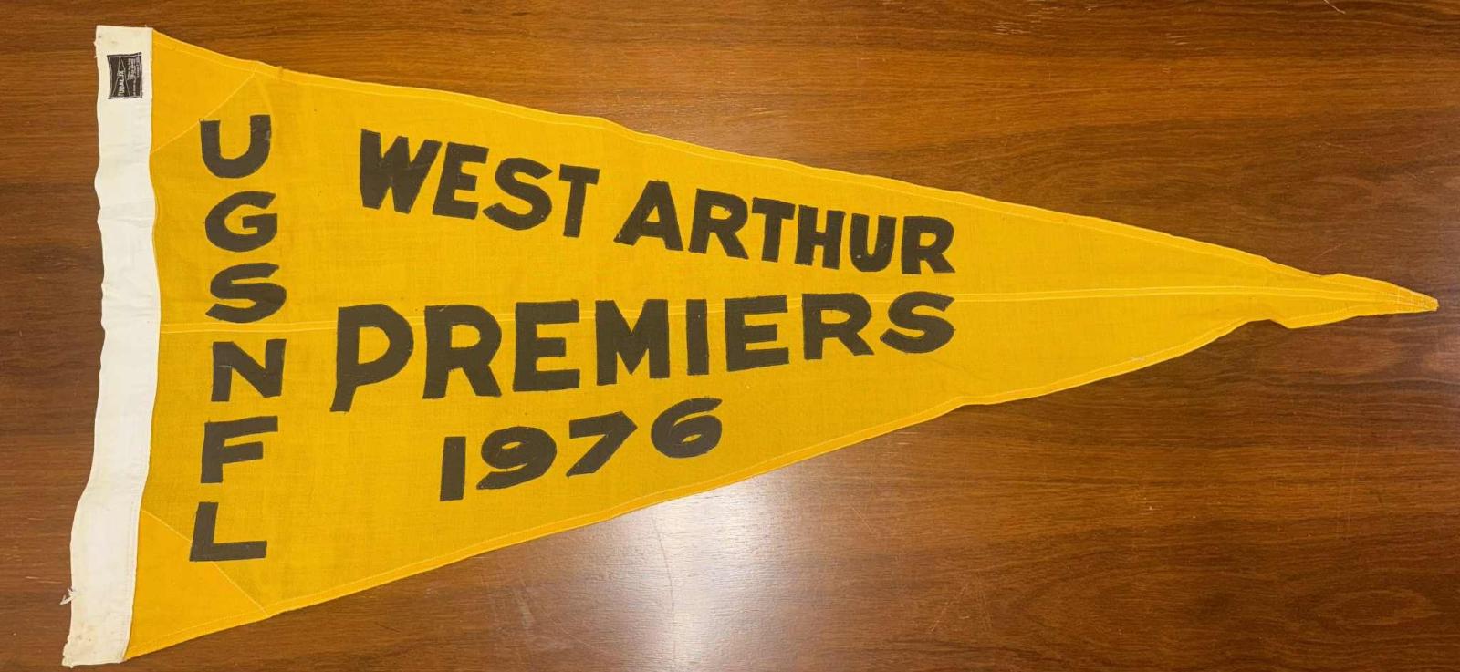 Yellow, black and white premier flag