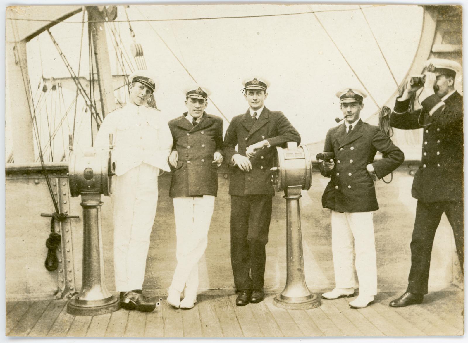 Photo of Raymond WARBURTON (third from left) with 4 other crew members aboard the SS Pera