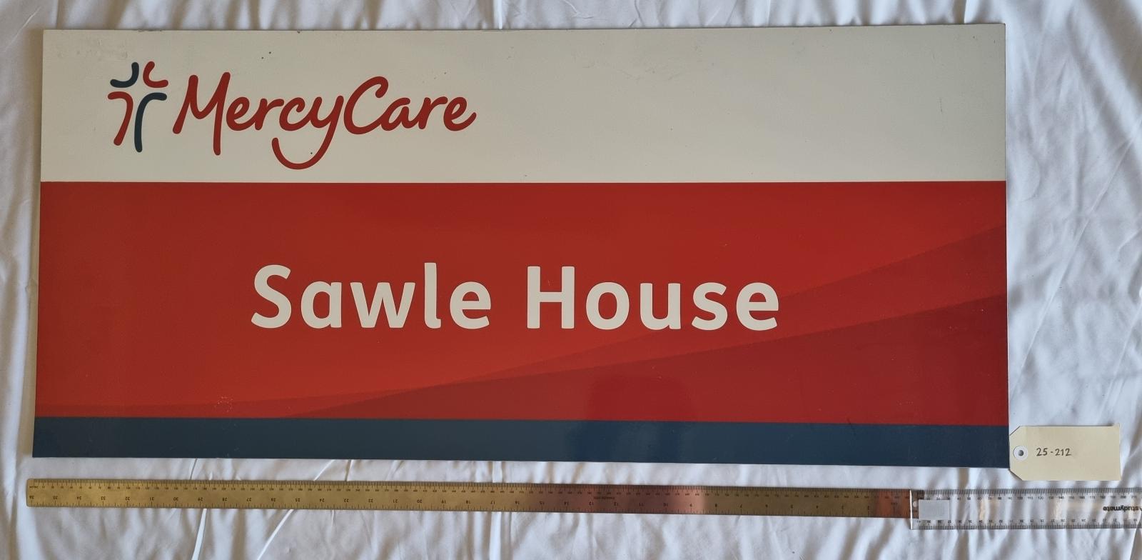 25-212 MercyCare Sawle House image with scale and tag.