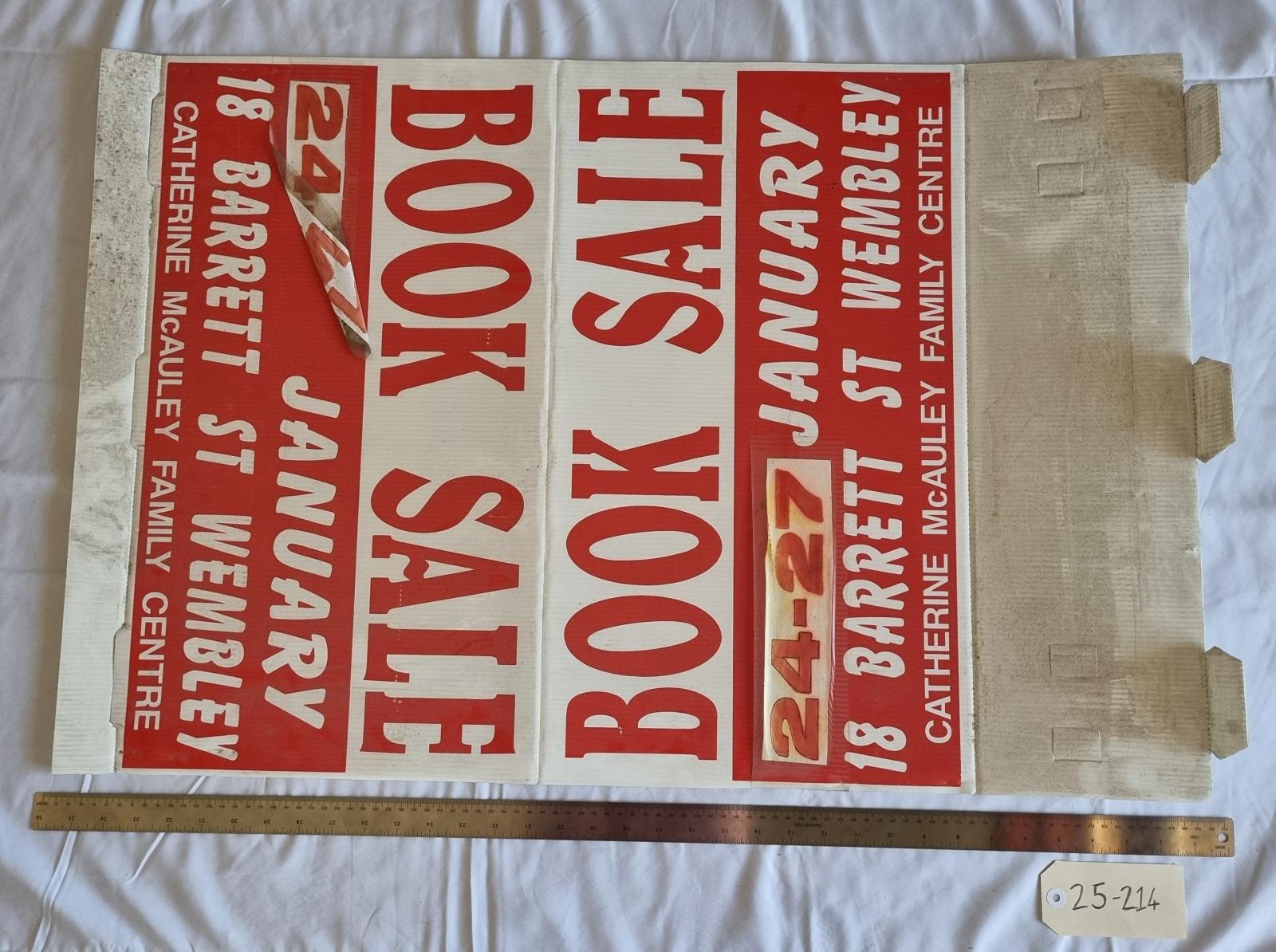 25-214 MercyCare Book sale foldable sign image with scale and tag. 
