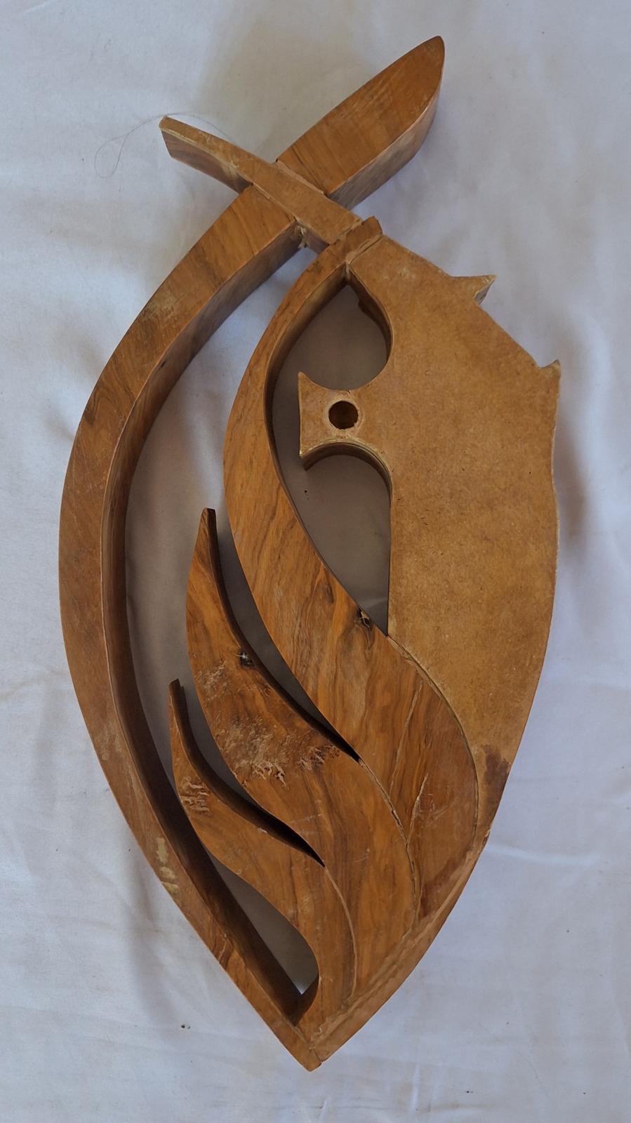 25-235 MercyCare Wooden sculpture: flame enclosing a mercy cross image of the back of object