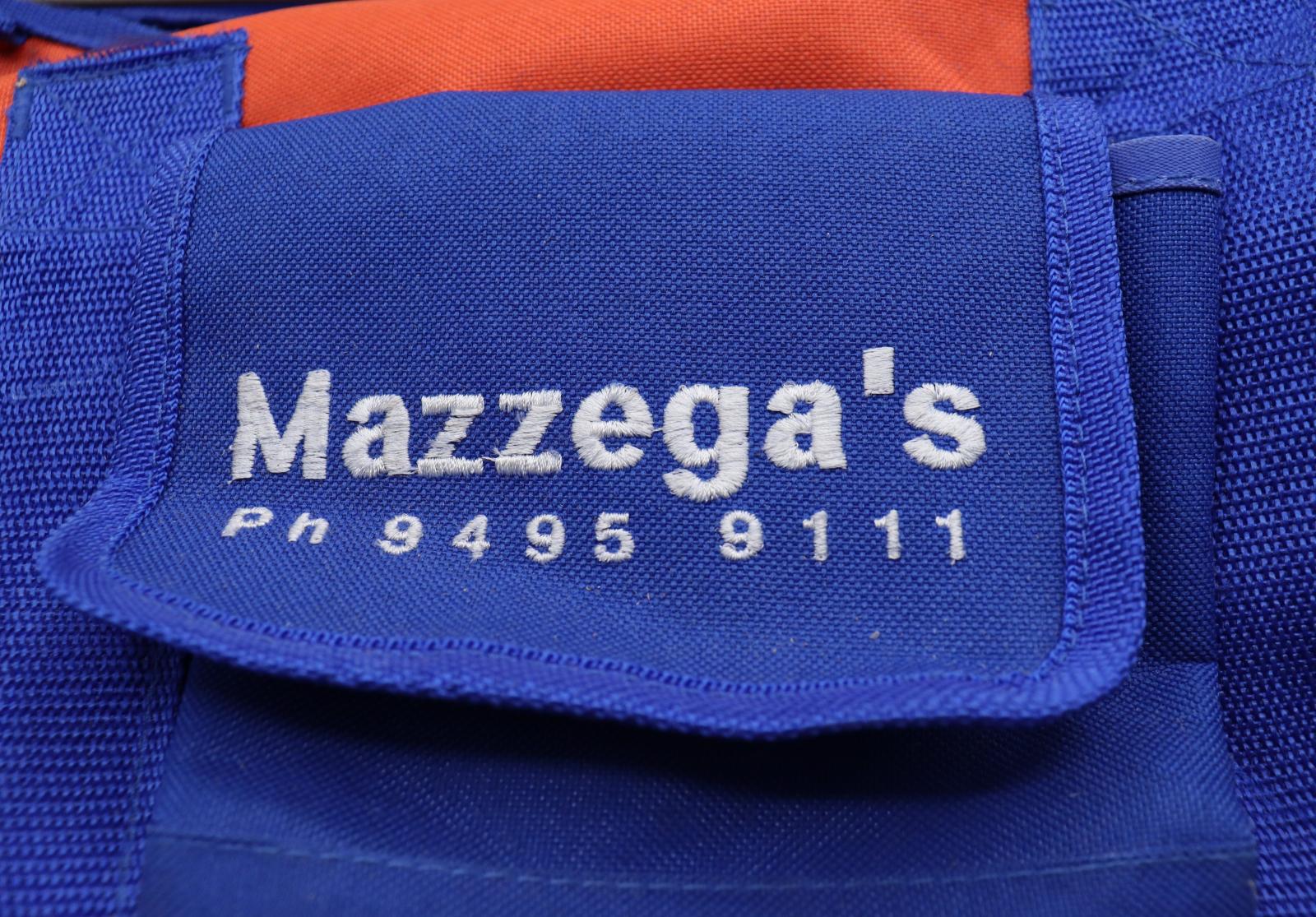 Close up of Mazzega's tool bag, with text