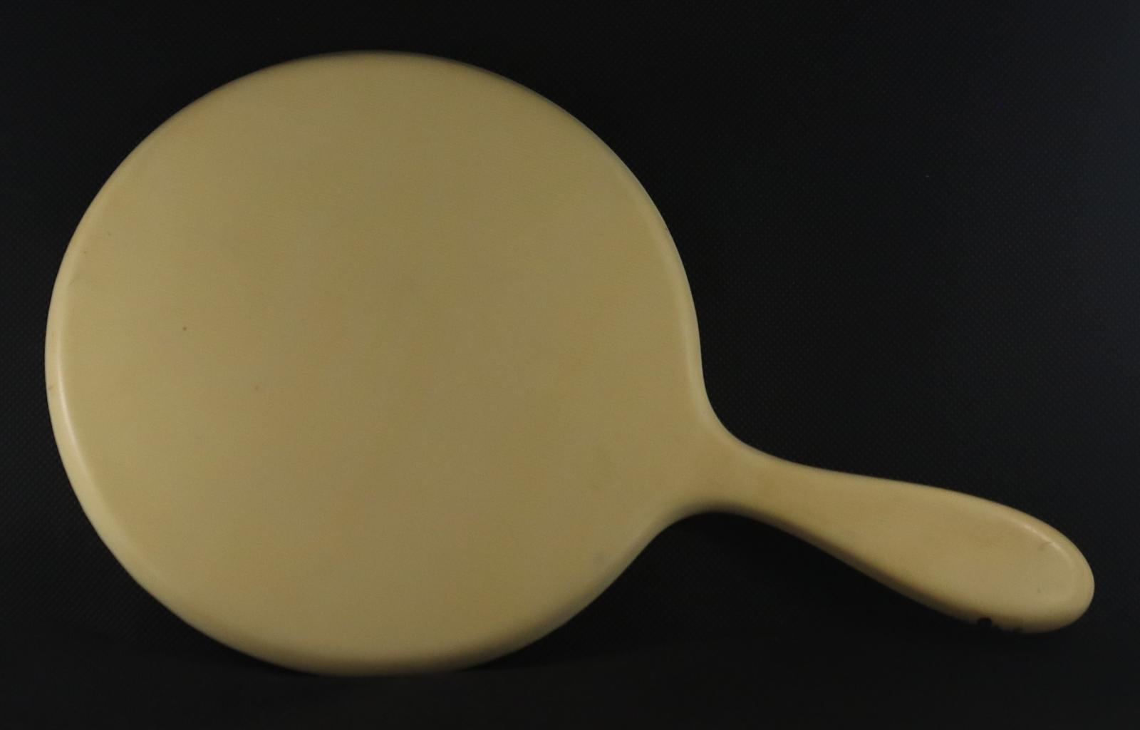 Back of Hand Held Mirror