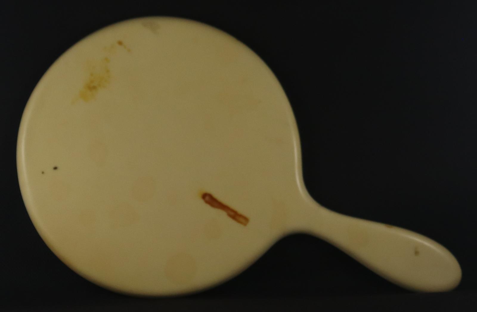 Back of Hand Held Mirror