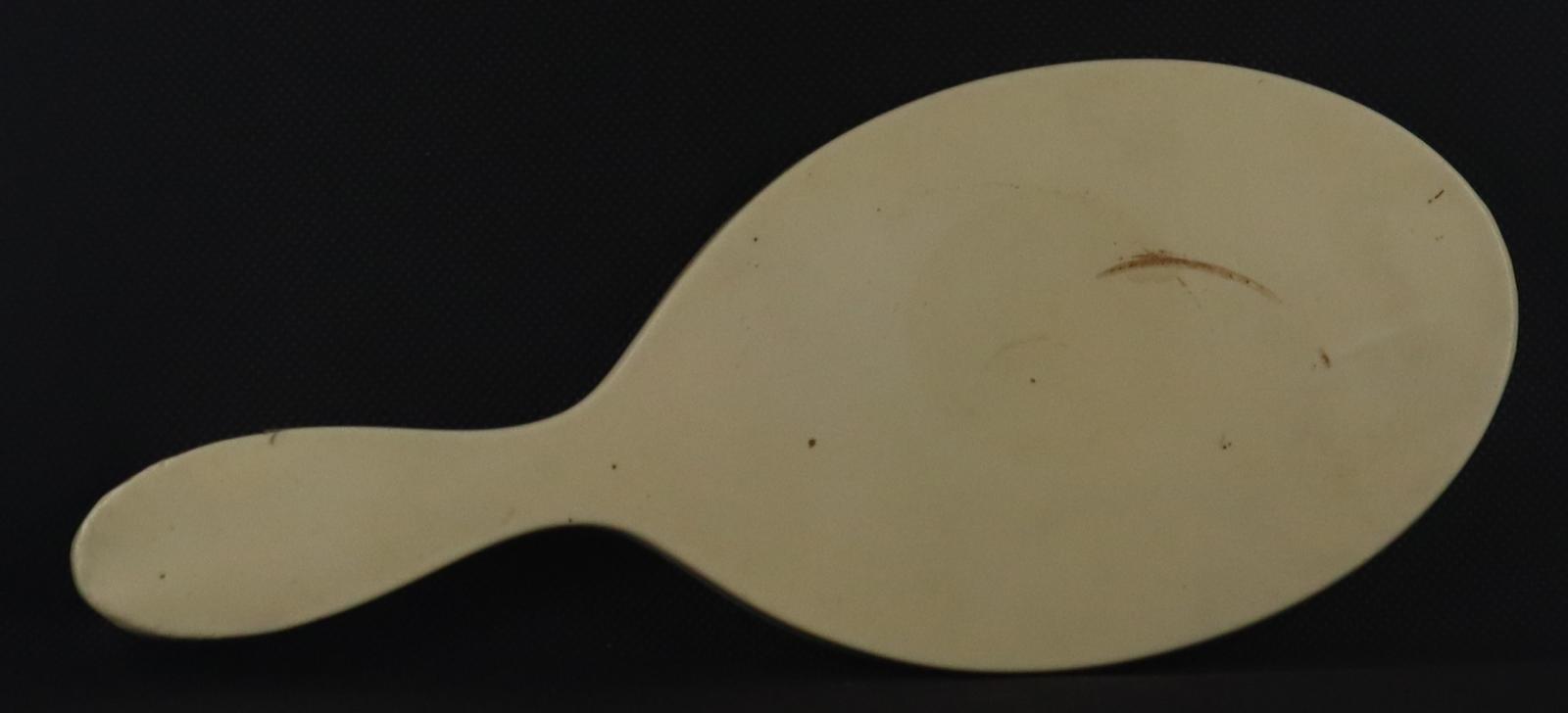 Back of Hand Held Mirror