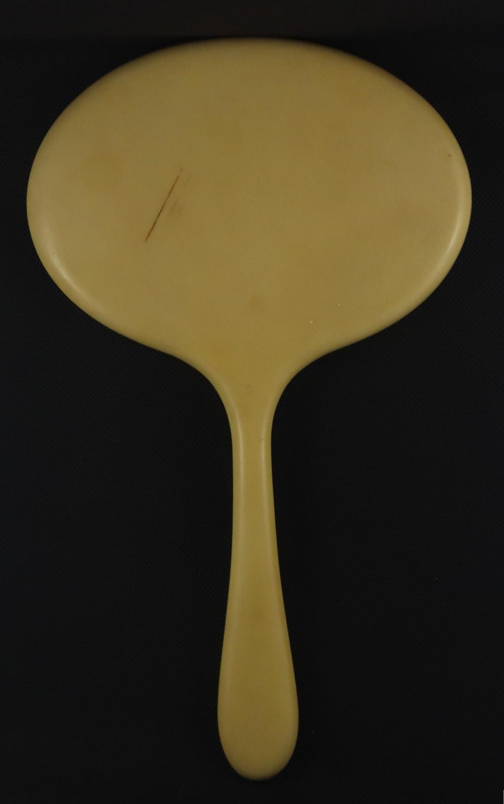 Back of Hand Held Mirror