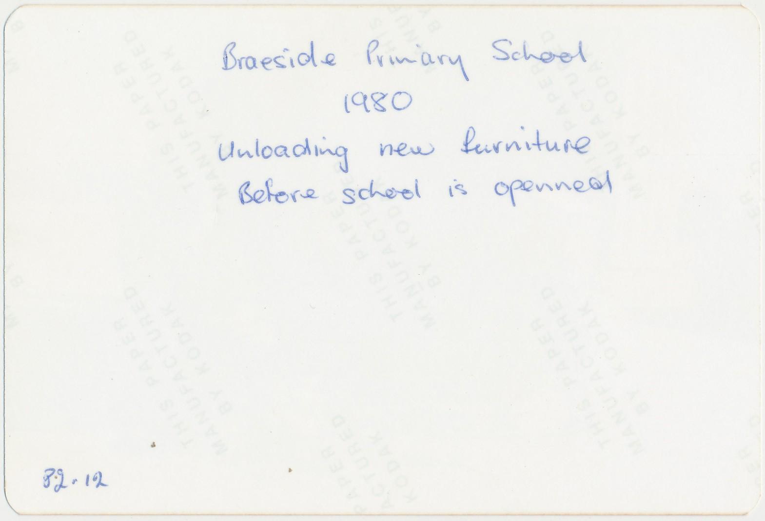 Back of photograph of unloading furniture for Braeside School