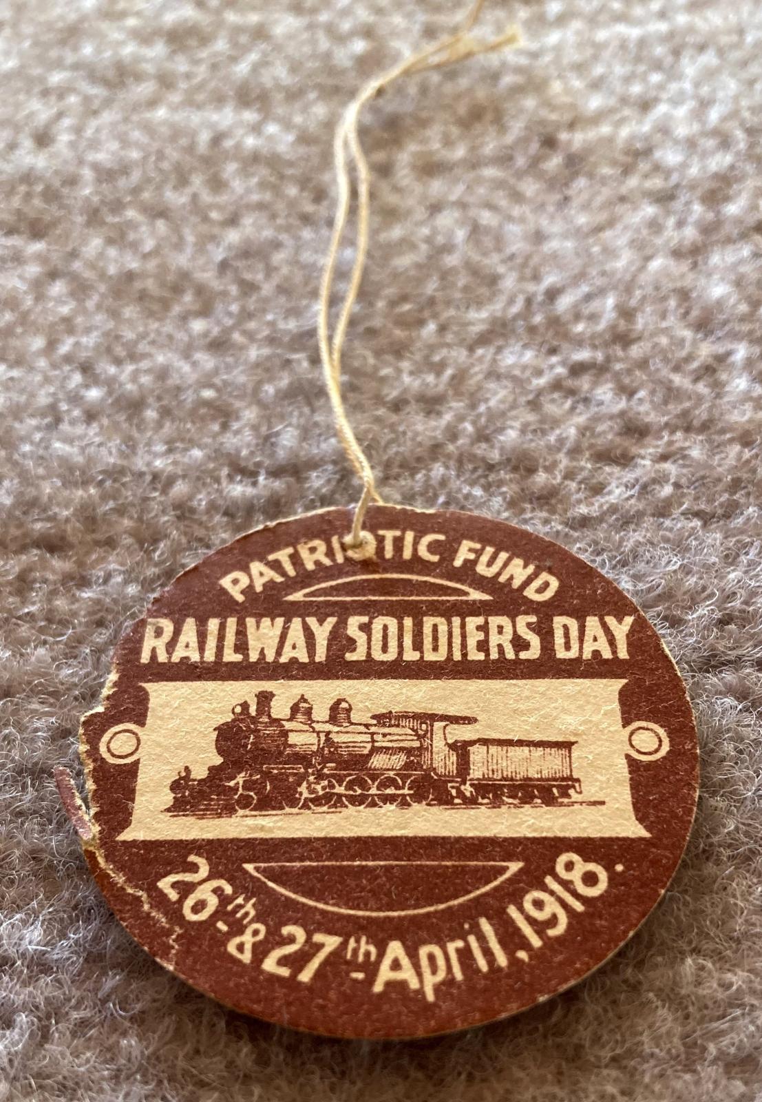 Angled view of WWI fundraising tag - Railway Soldiers Day Patriotic Fund 1918