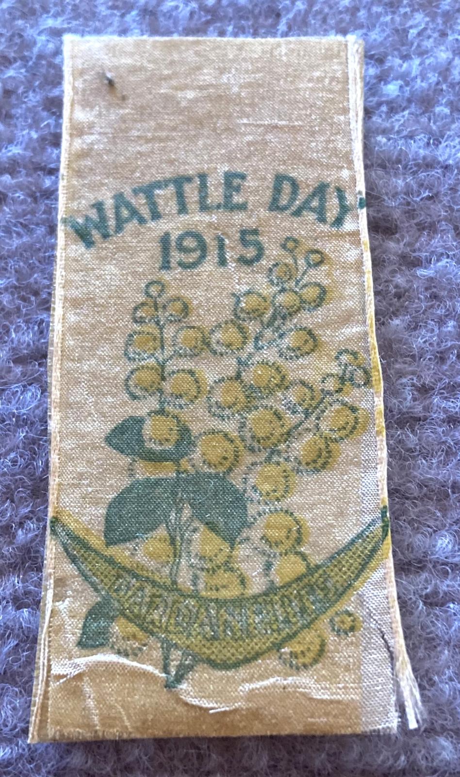Angled view of Wattle Day 1915 fundraising ribbon