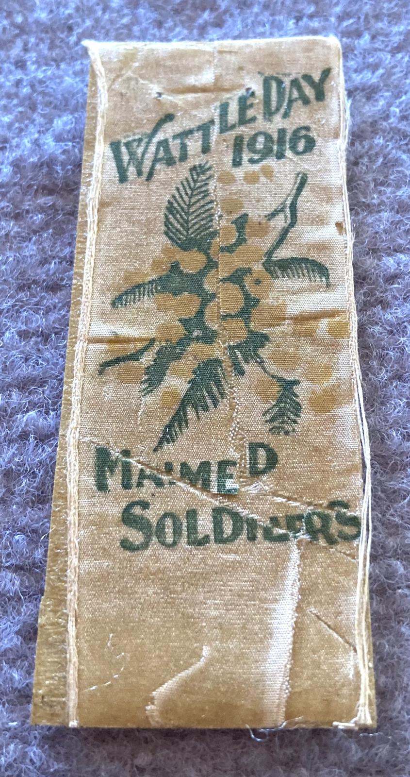 Angled view of Wattle Day 1916 fundraising ribbon
