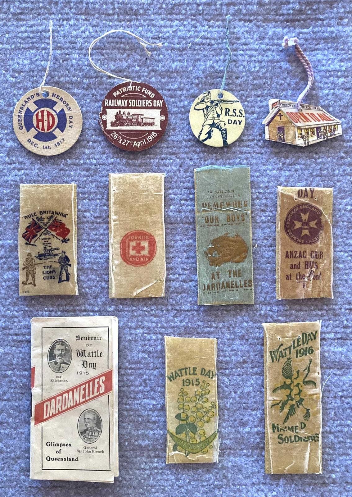 Group of fundraising ribbons and tags associated with Roy Dennett