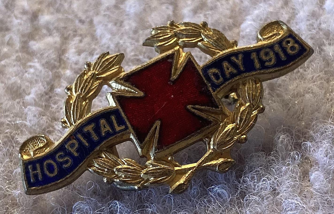 Oblique view of 'Hospital Day 1918' metal and enamel fundraising brooch 