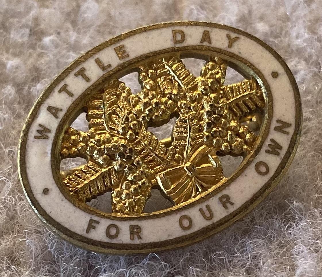 Oblique view of 'Wattle Day 1918' metal and enamel fundraising brooch