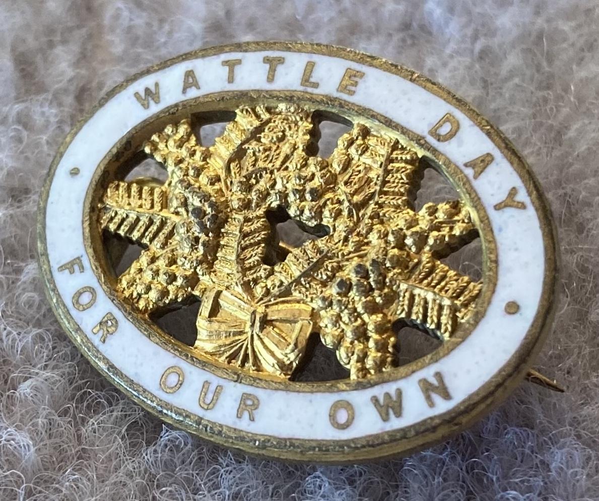 Other oblique view of 'Wattle Day 1918' metal and enamel fundraising brooch