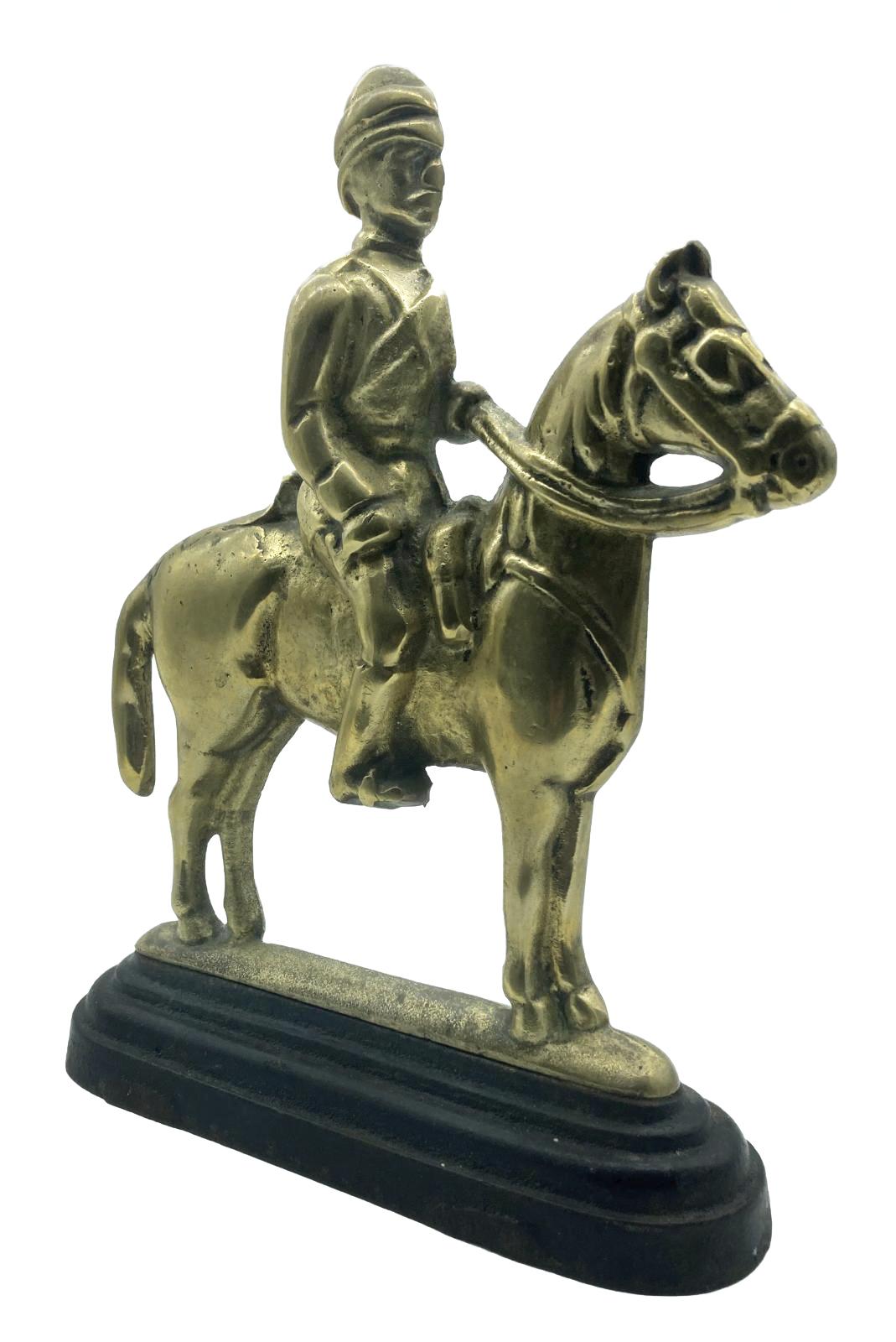 Lord Kitchener cast brass and iron doorstop - oblique view