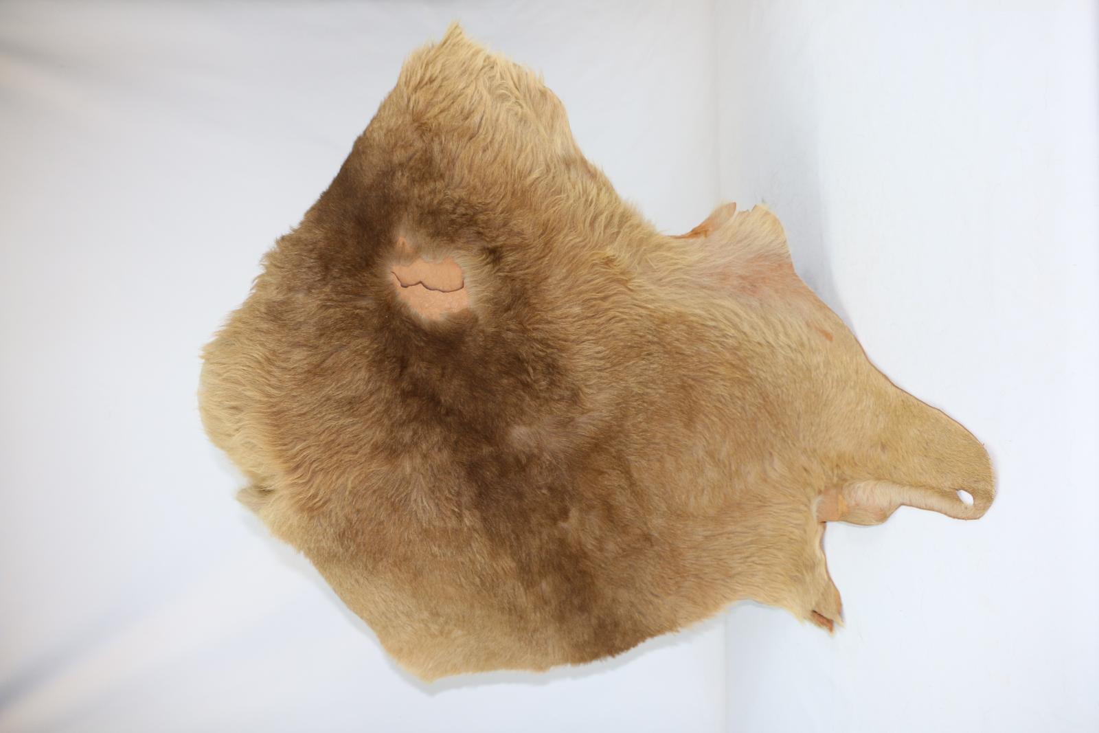 Buka, supposed to be doll sized but has not been cut out yet. Kangaroo pelt, fur Side