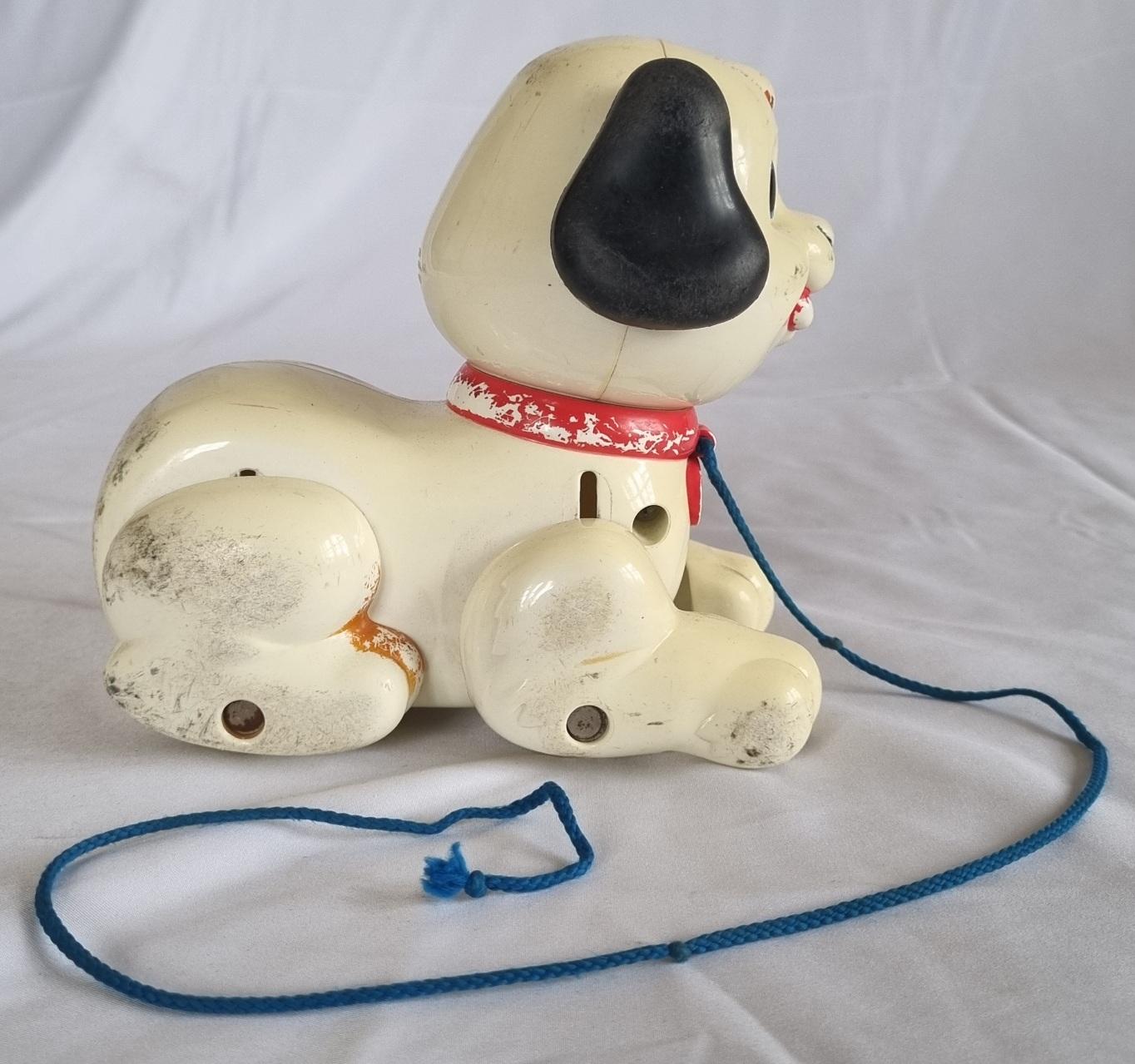 26-246 Pulling toy dog photo with background side view.